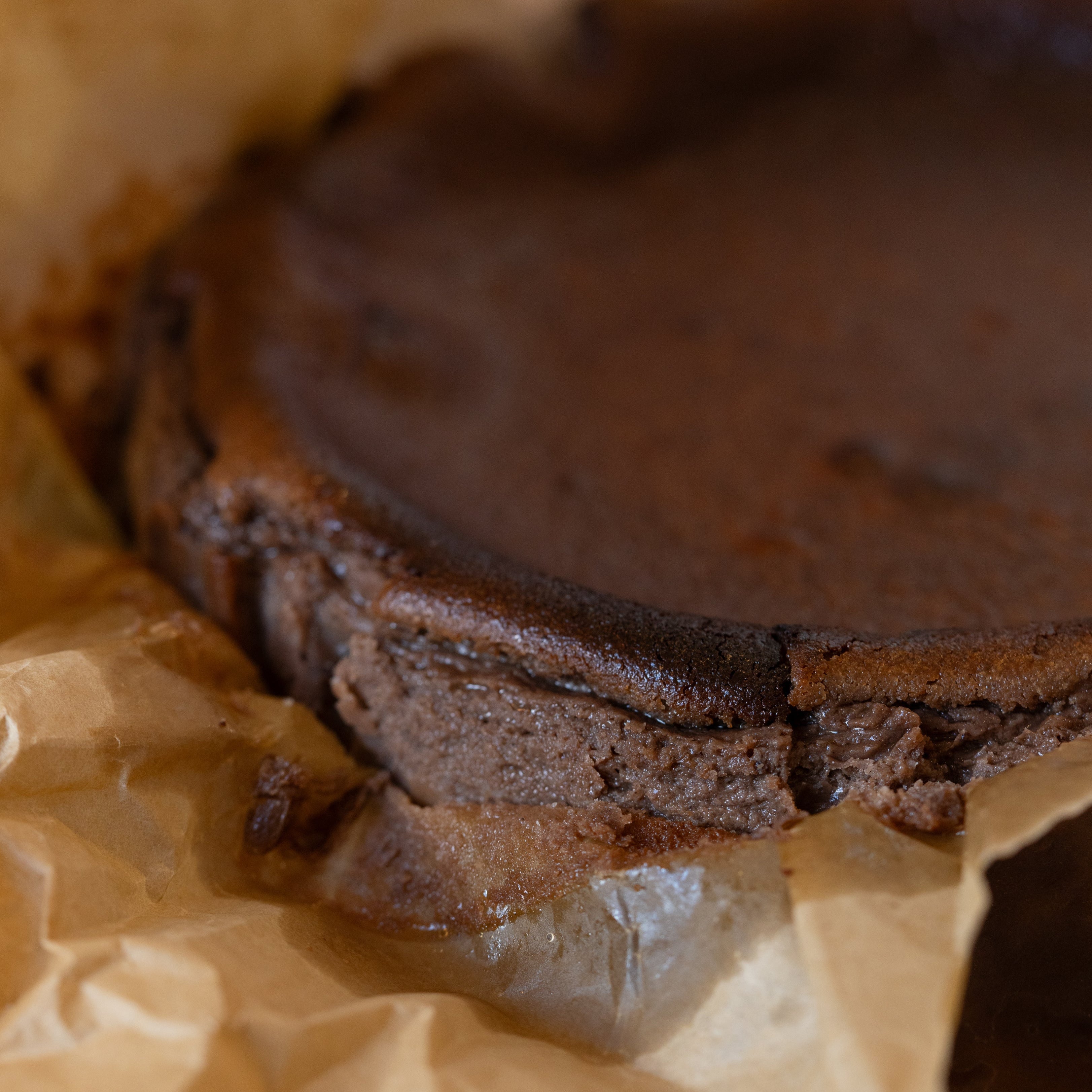 Close-up of a chocolate cookie on brown paper